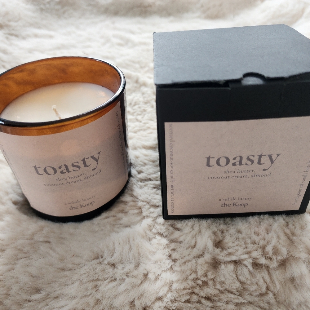 Scented Shea butter, coconut cream,almond candle net wt.12 ounces